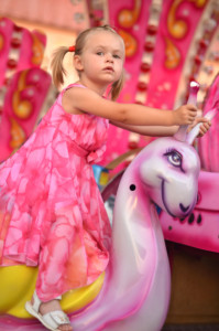 Girl on carousel