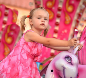 girl on carousel